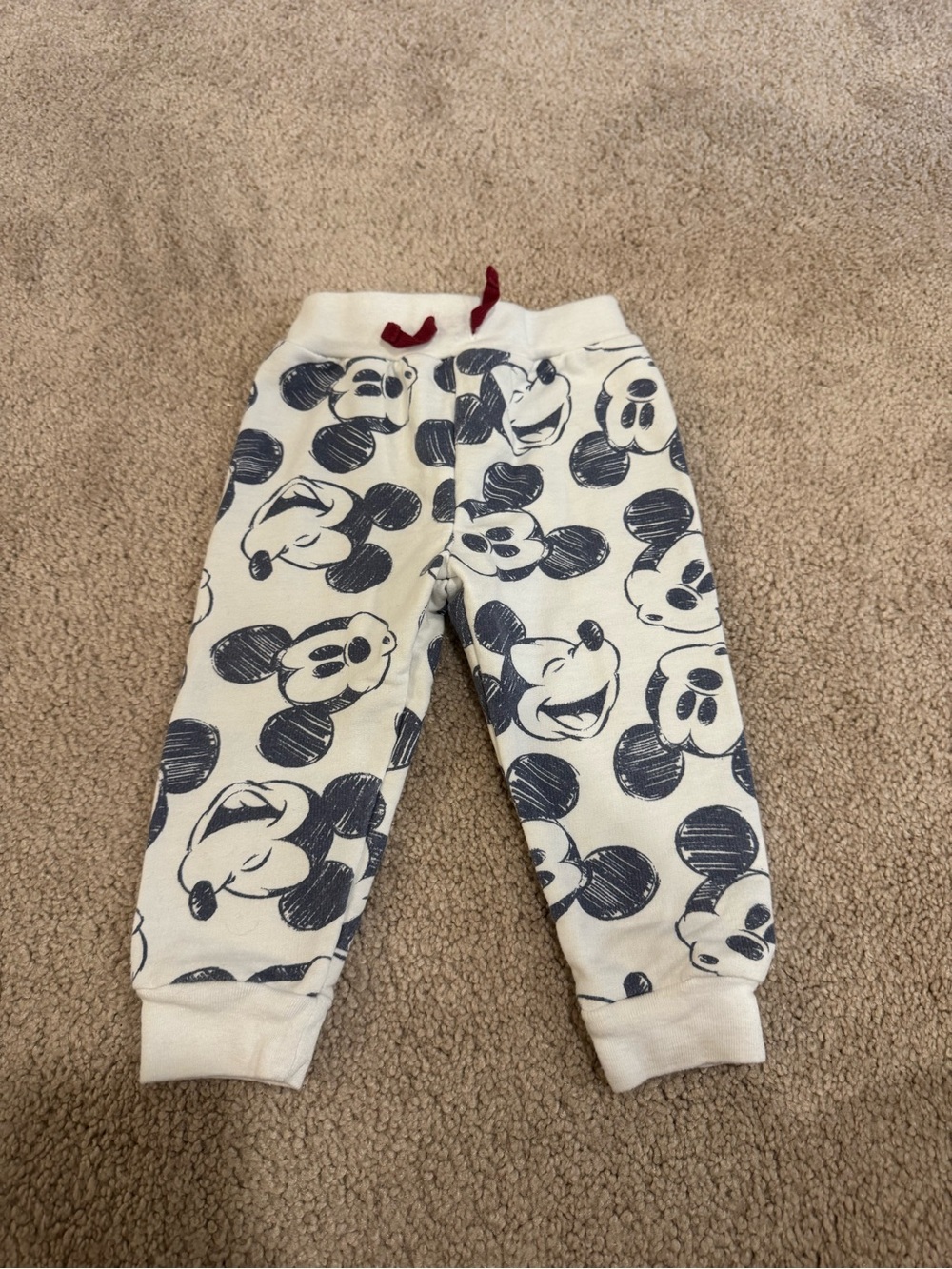 Disney Baby Cream Joggers with Navy Mickey Print and Red Drawstring Size 12M